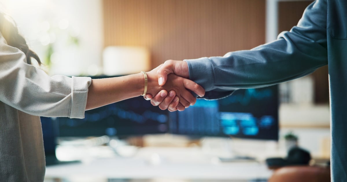 Business consulting handshake confirming an advisory agreement